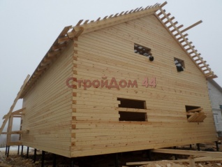 Дом из проф. бруса 145х145 мм размером 10х13 м построенный в марте 2015г. в Нарофоминском р-не